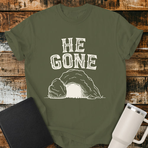 hemp green Christian T-shirt featuring an empty tomb illustration with the words “He Gone” in distressed cream lettering.