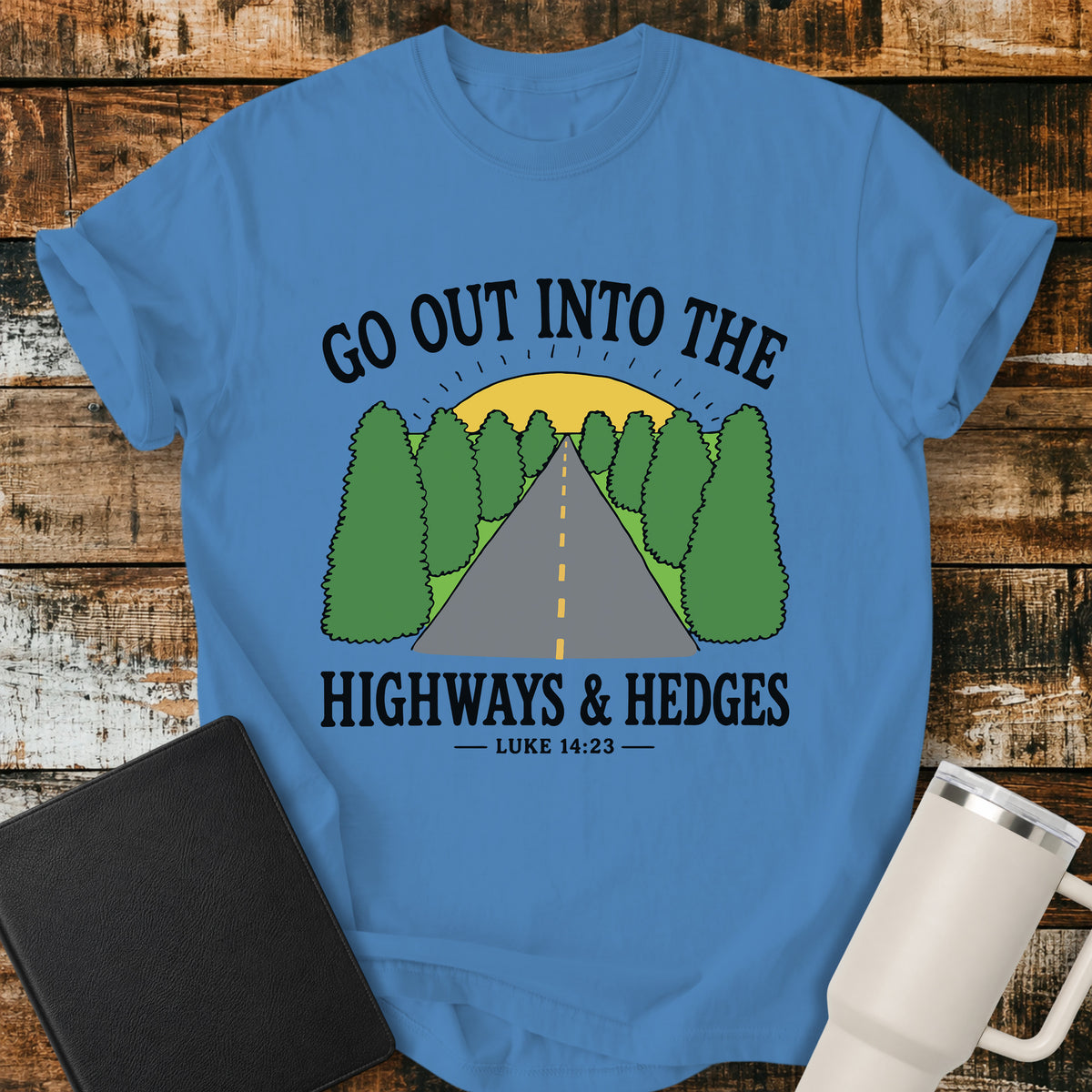 royal caribe Christian t-shirt featuring a retro highway stretching through green hedges toward a sunrise, with the message “Go Out Into the Highways & Hedges” and the scripture reference Luke 14:23.