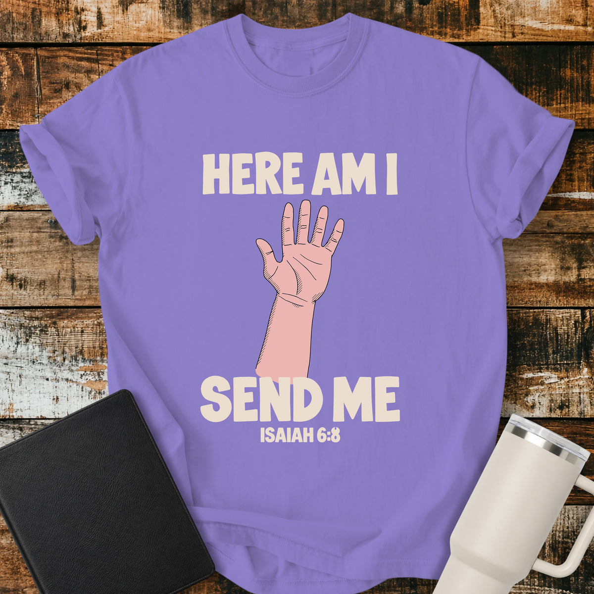 violet Christian T-shirt featuring a raised hand with the words “Here Am I Send Me” and “Isaiah 6:8” in cream lettering.