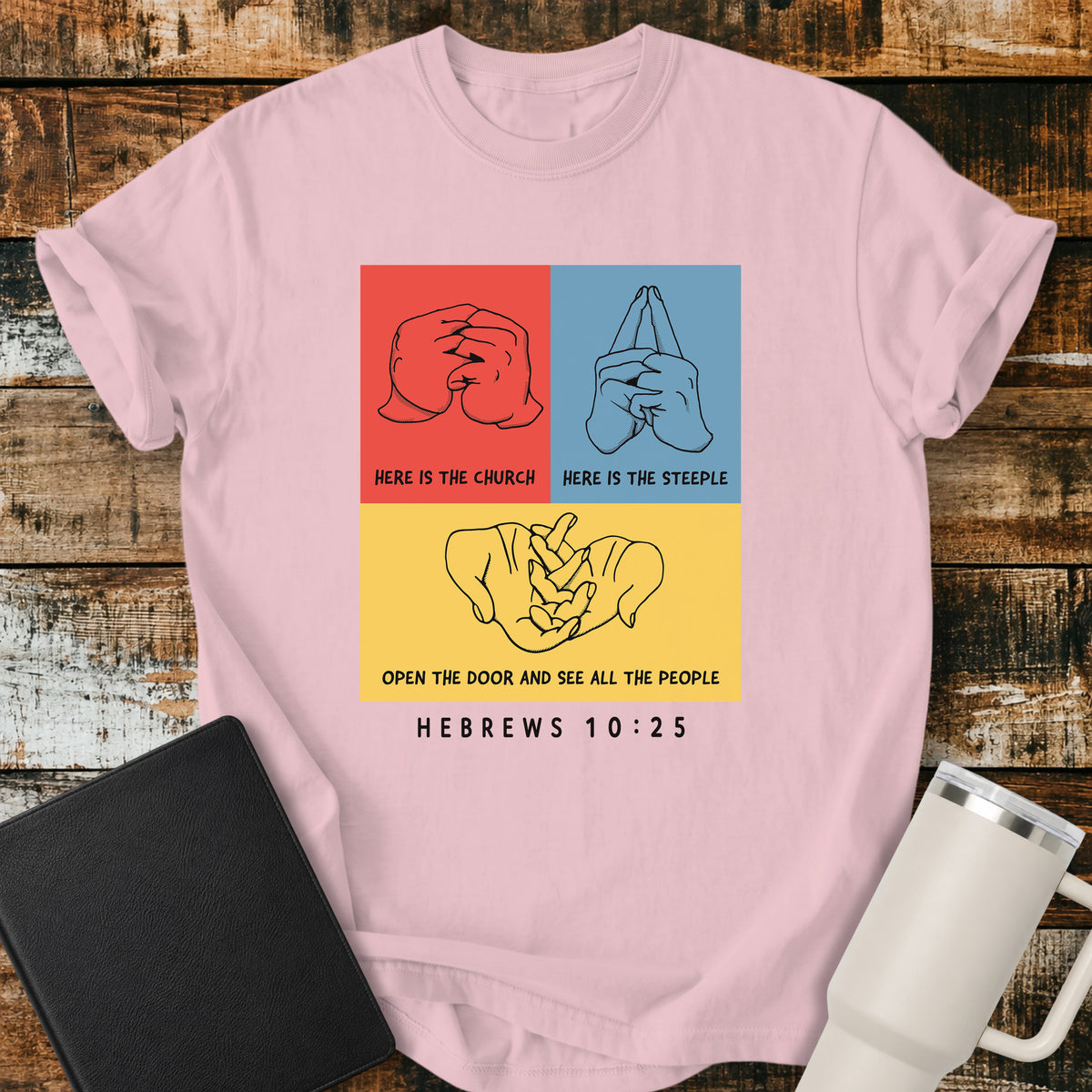 blossom pink Christian t-shirt featuring a three-panel hand illustration of the classic “Here Is the Church, Here Is the Steeple, Open the Door and See All the People” finger rhyme, paired with Hebrews 10:25.