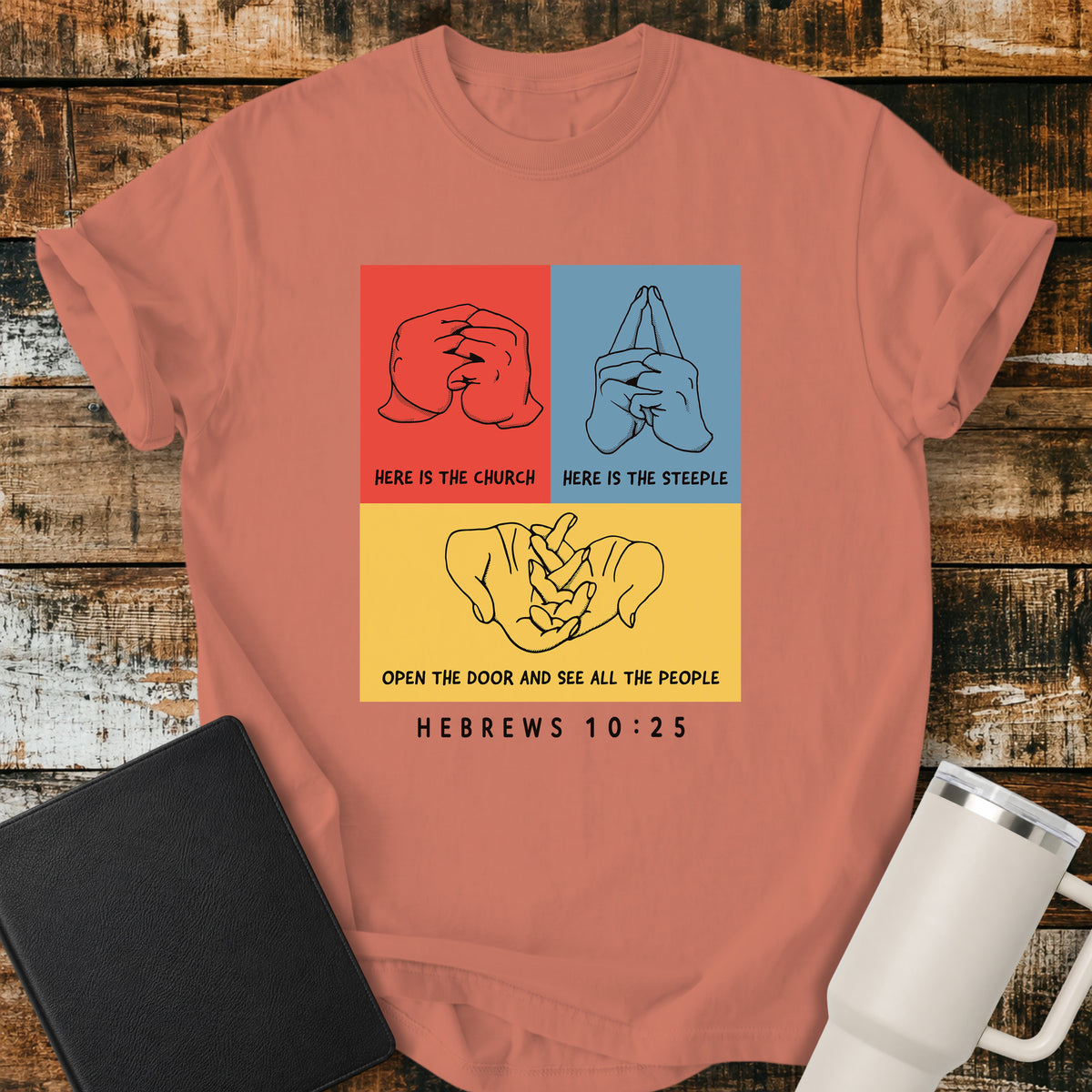 Terracotta Christian t-shirt featuring a three-panel hand illustration of the classic “Here Is the Church, Here Is the Steeple, Open the Door and See All the People” finger rhyme, paired with Hebrews 10:25.