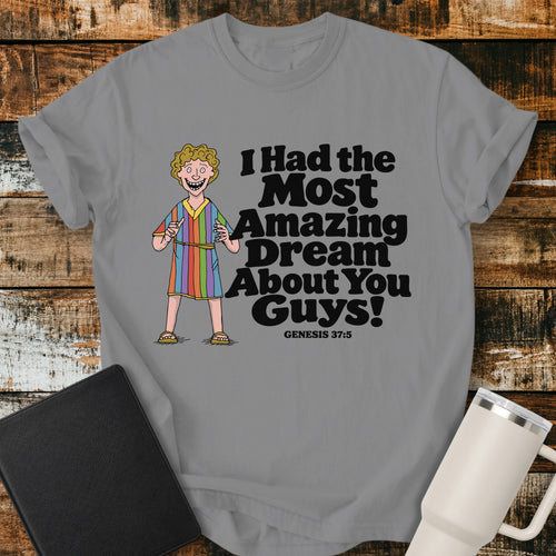 Grey Christian T-shirt featuring Joseph in a colorful coat with the humorous phrase “I Had the Most Amazing Dream About You Guys!” and “Genesis 37:5” in black lettering.