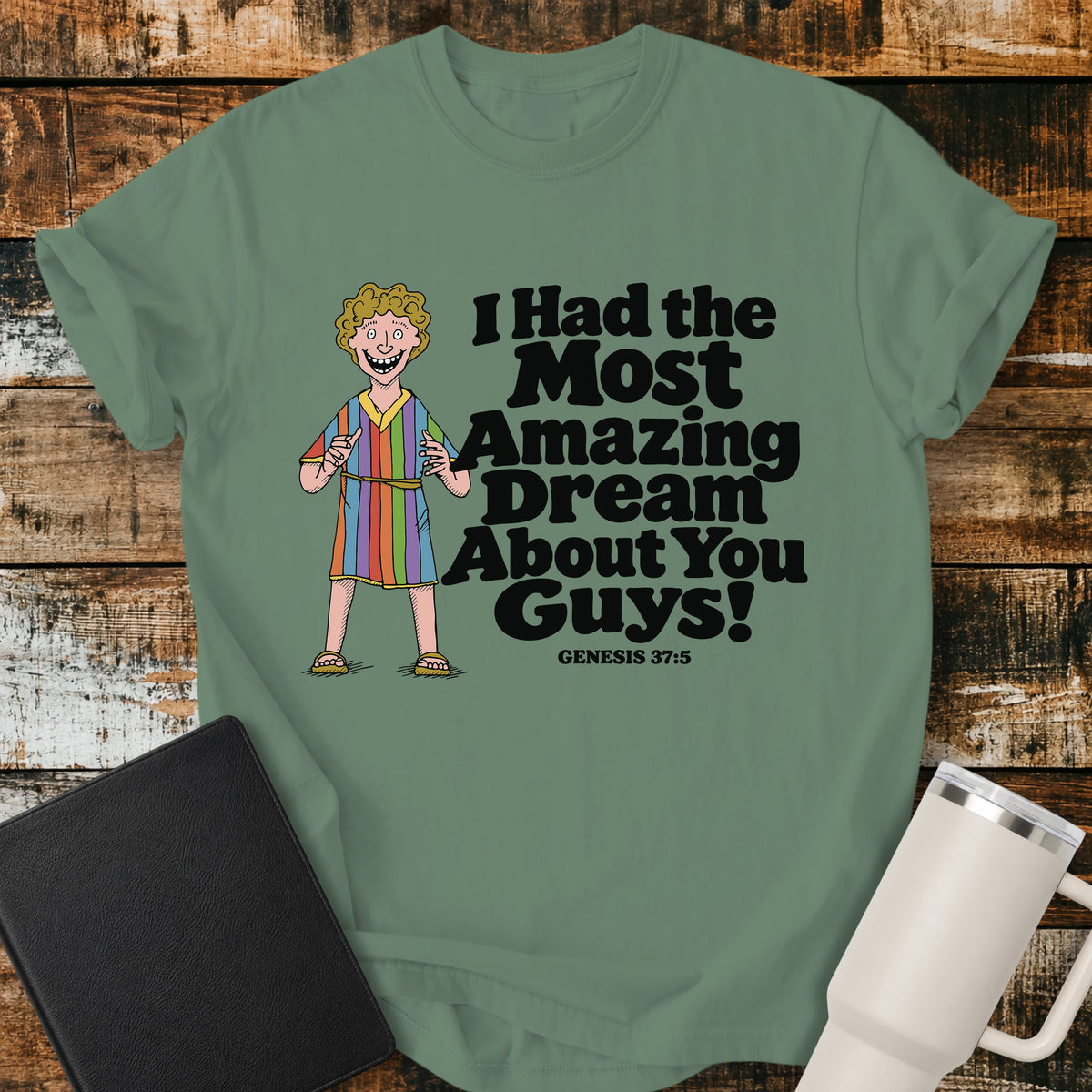 light green Christian T-shirt featuring Joseph in a colorful coat with the humorous phrase “I Had the Most Amazing Dream About You Guys!” and “Genesis 37:5” in black lettering.