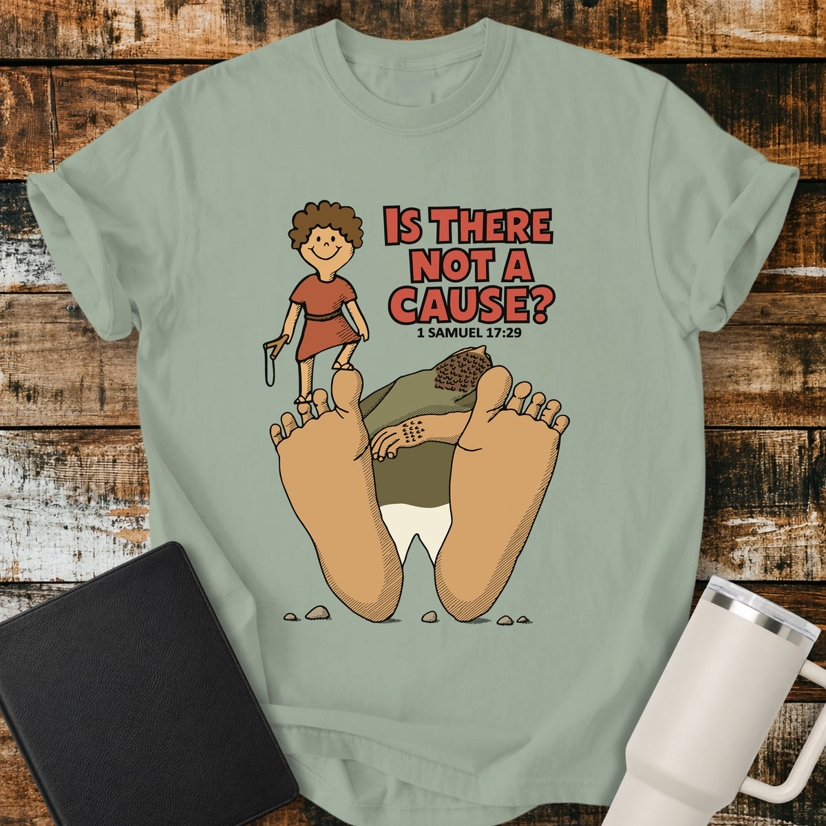 bay green Christian t-shirt featuring David standing victorious over Goliath with the bold question “Is There Not a Cause?” and the scripture reference 1 Samuel 17:29.