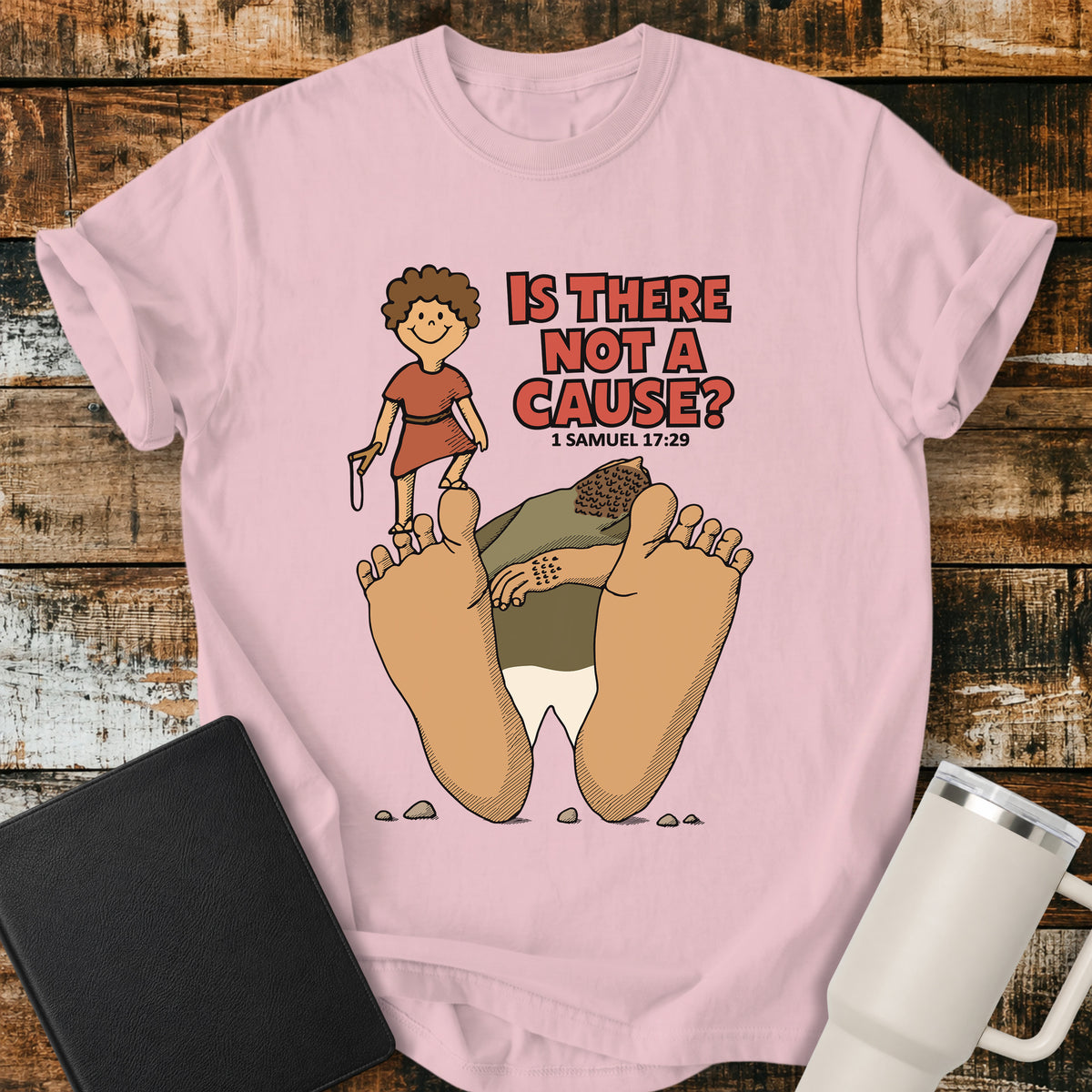 blossom pink Christian t-shirt featuring David standing victorious over Goliath with the bold question “Is There Not a Cause?” and the scripture reference 1 Samuel 17:29.