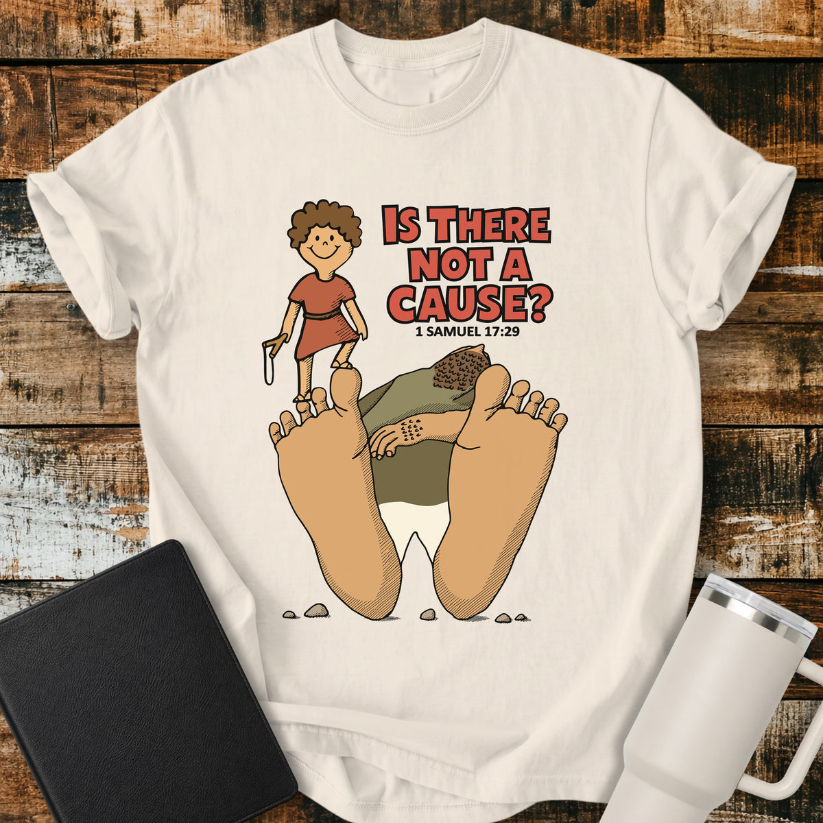 ivory Christian t-shirt featuring David standing victorious over Goliath with the bold question “Is There Not a Cause?” and the scripture reference 1 Samuel 17:29.