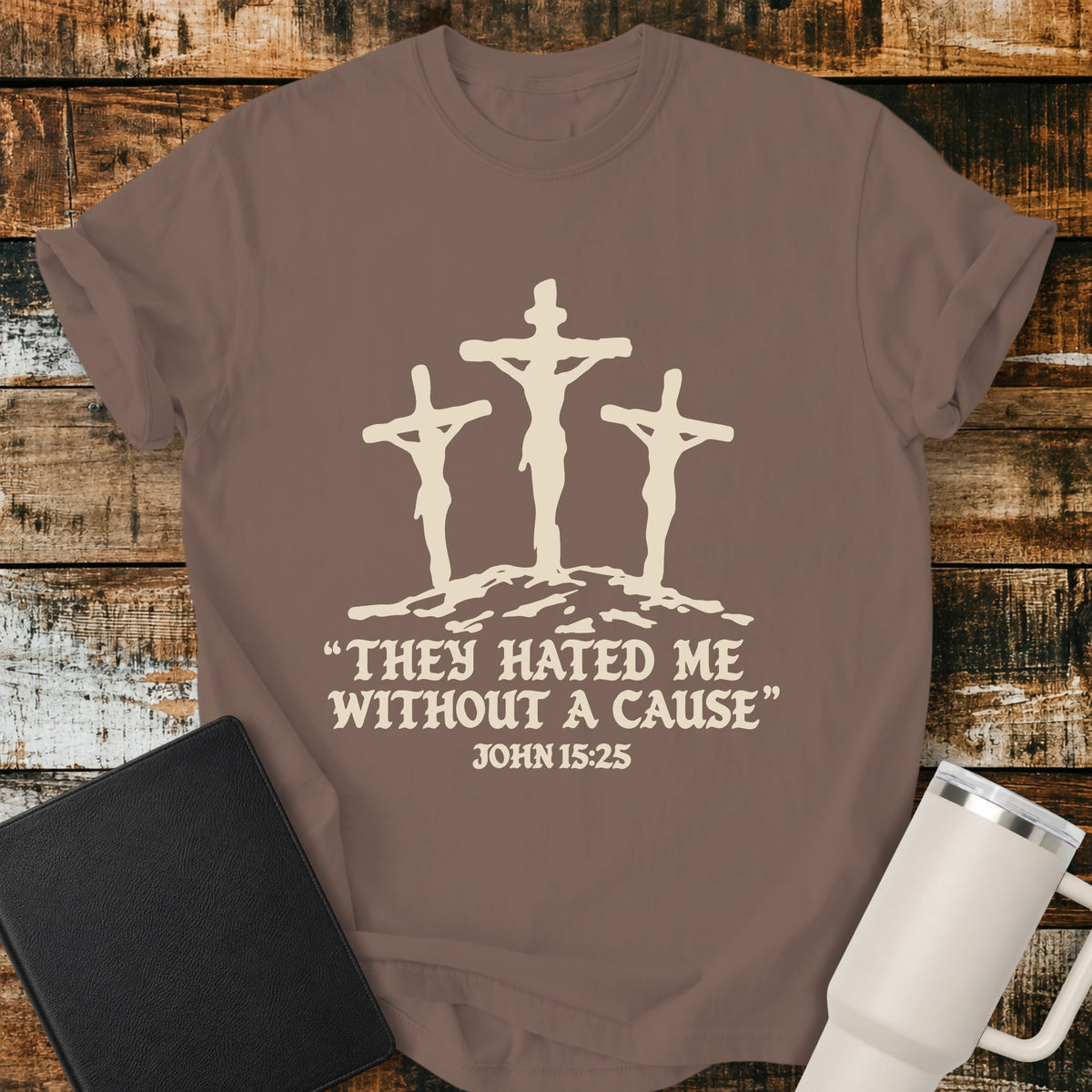 espresso brown Christian T-shirt featuring three crosses with the words “They Hated Me Without a Cause” and “John 15:25” in cream lettering.