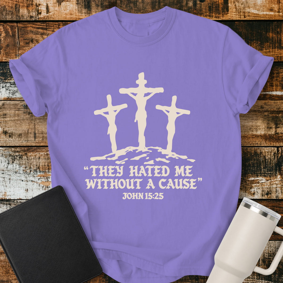 violet Christian T-shirt featuring three crosses with the words “They Hated Me Without a Cause” and “John 15:25” in cream lettering.